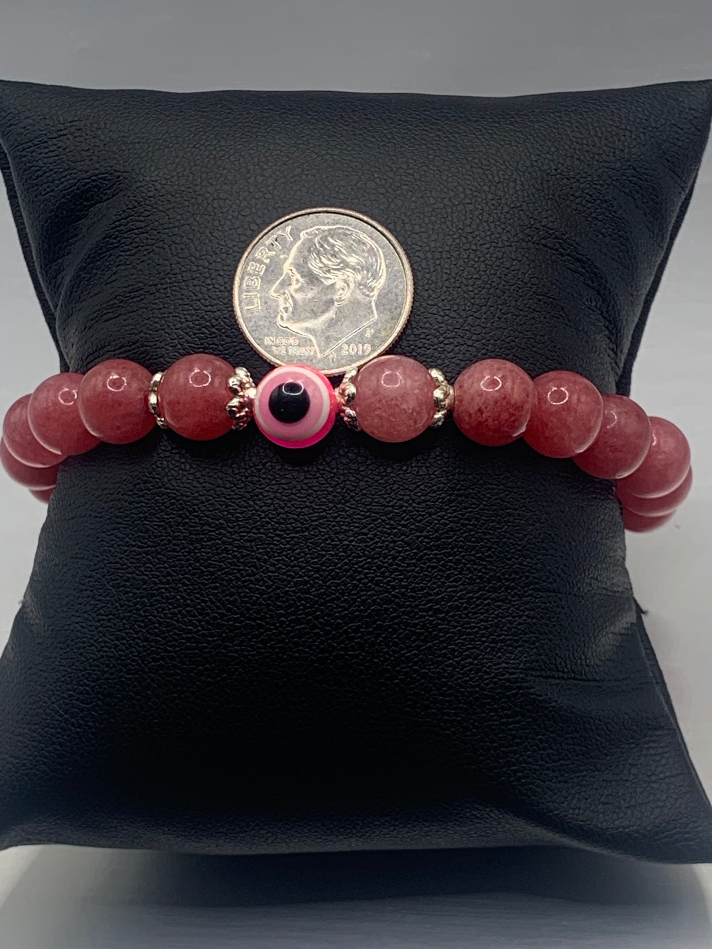 Pink chalcedony semi precious stone/crystal with resin evil eye beaded elastic bracelet