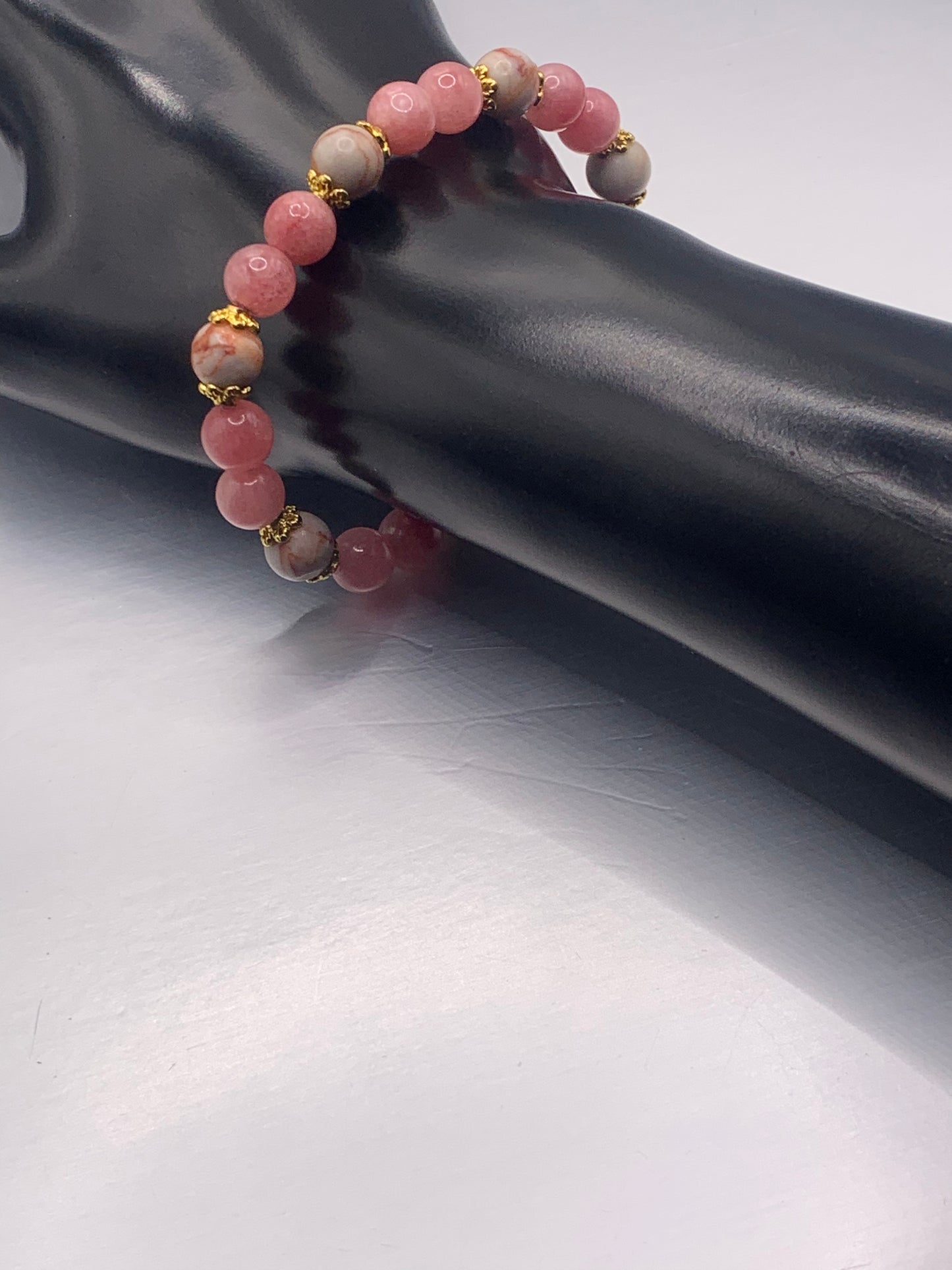 Red vein jasper and pink chalcedony semi precious stone/crystal elastic beaded bracelet with gold plated flower bead caps