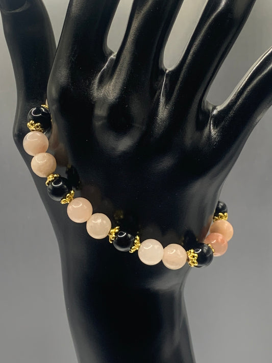 Black obsidian with pink aventurine semi precious stone/crystal beaded elastic bracelet with gold plated flower bead caps