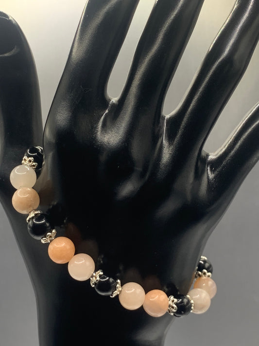 Black obsidian with pink aventurine semi precious stone/crystal beaded elastic bracelet with silver plated flower bead caps