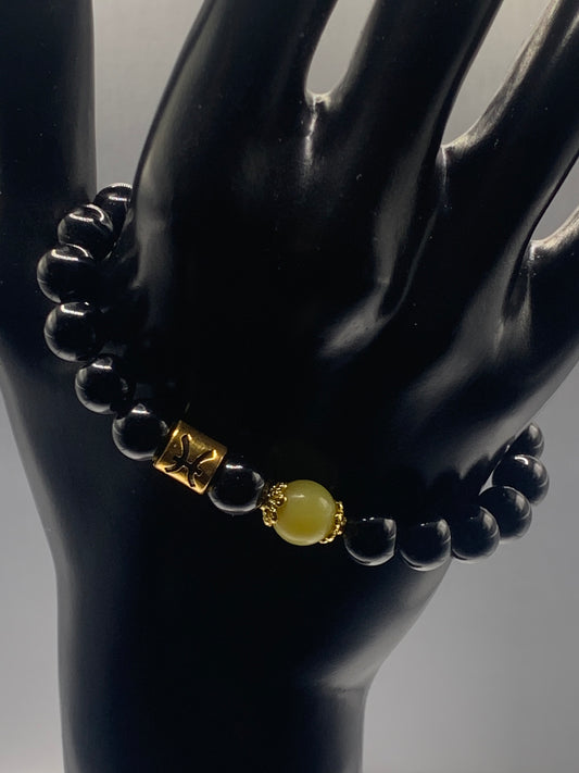 Pisces Zodiac black obsidian with yellow jade elastic beaded bracelet with gold accents