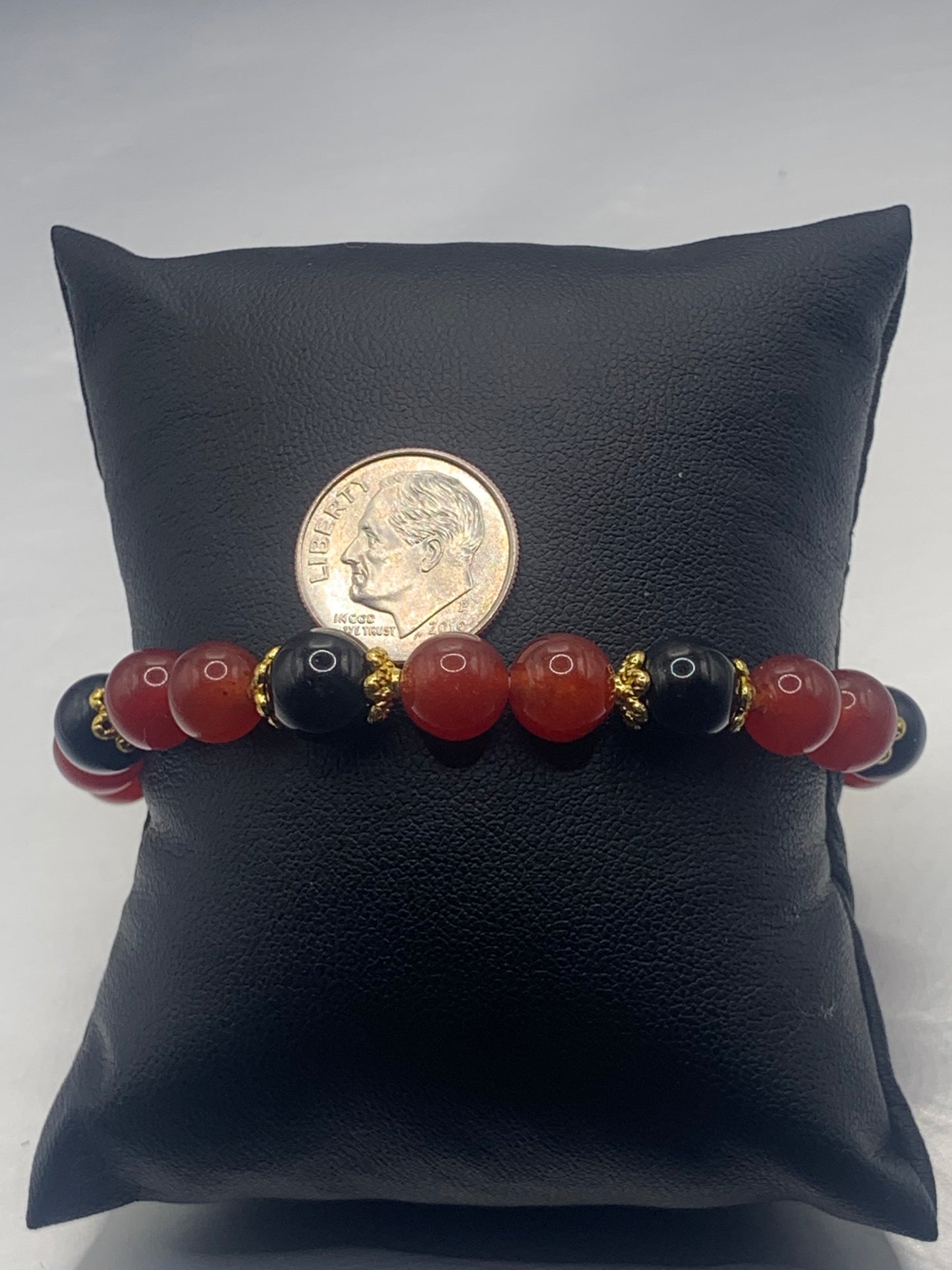 Black obsidian with red agate semi precious stone/crystal beaded elastic bracelet with gold plated flower bead caps