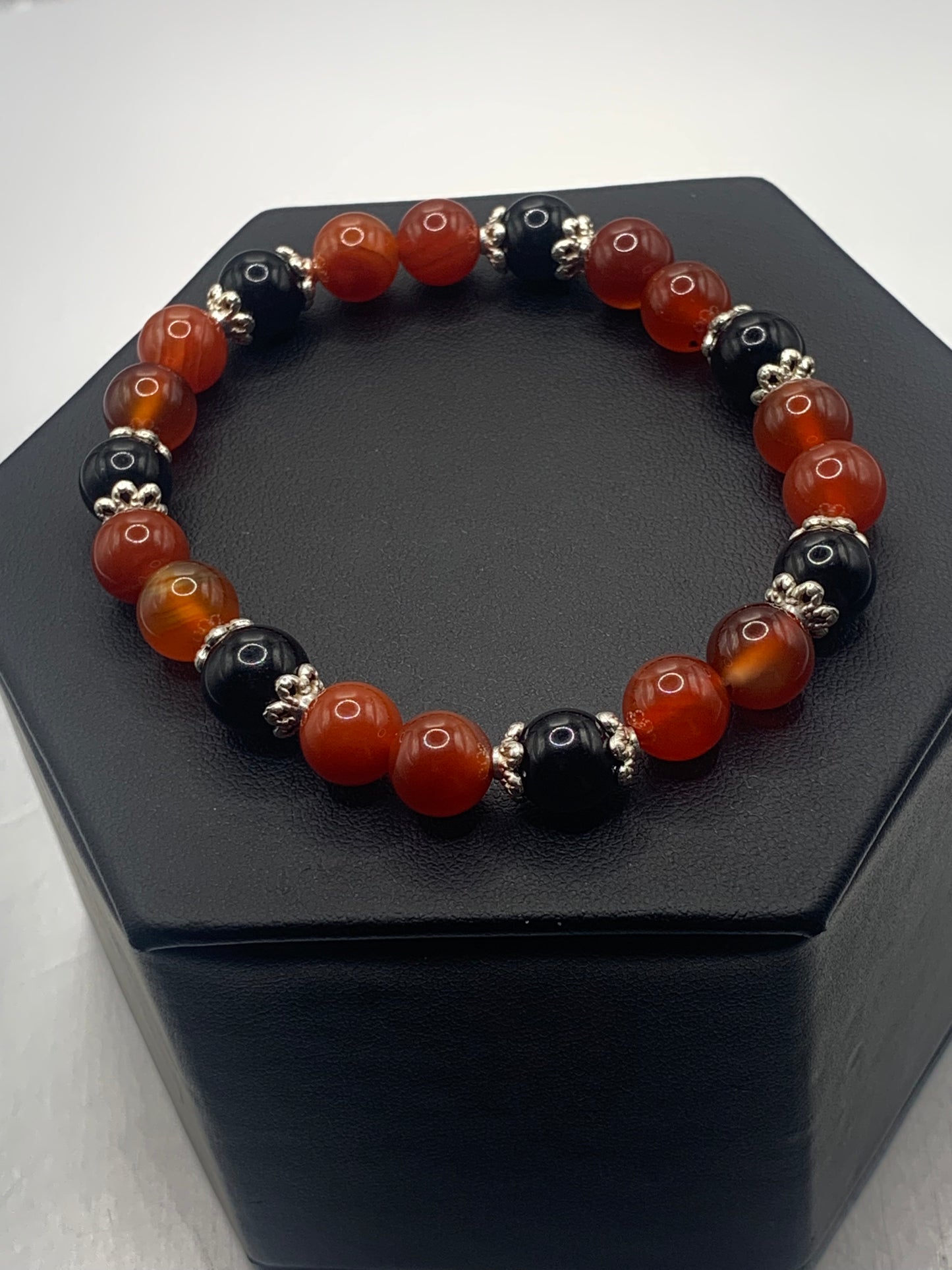 Black obsidian with red agate semi precious stone/crystal beaded elastic bracelet with silver plated flower bead caps