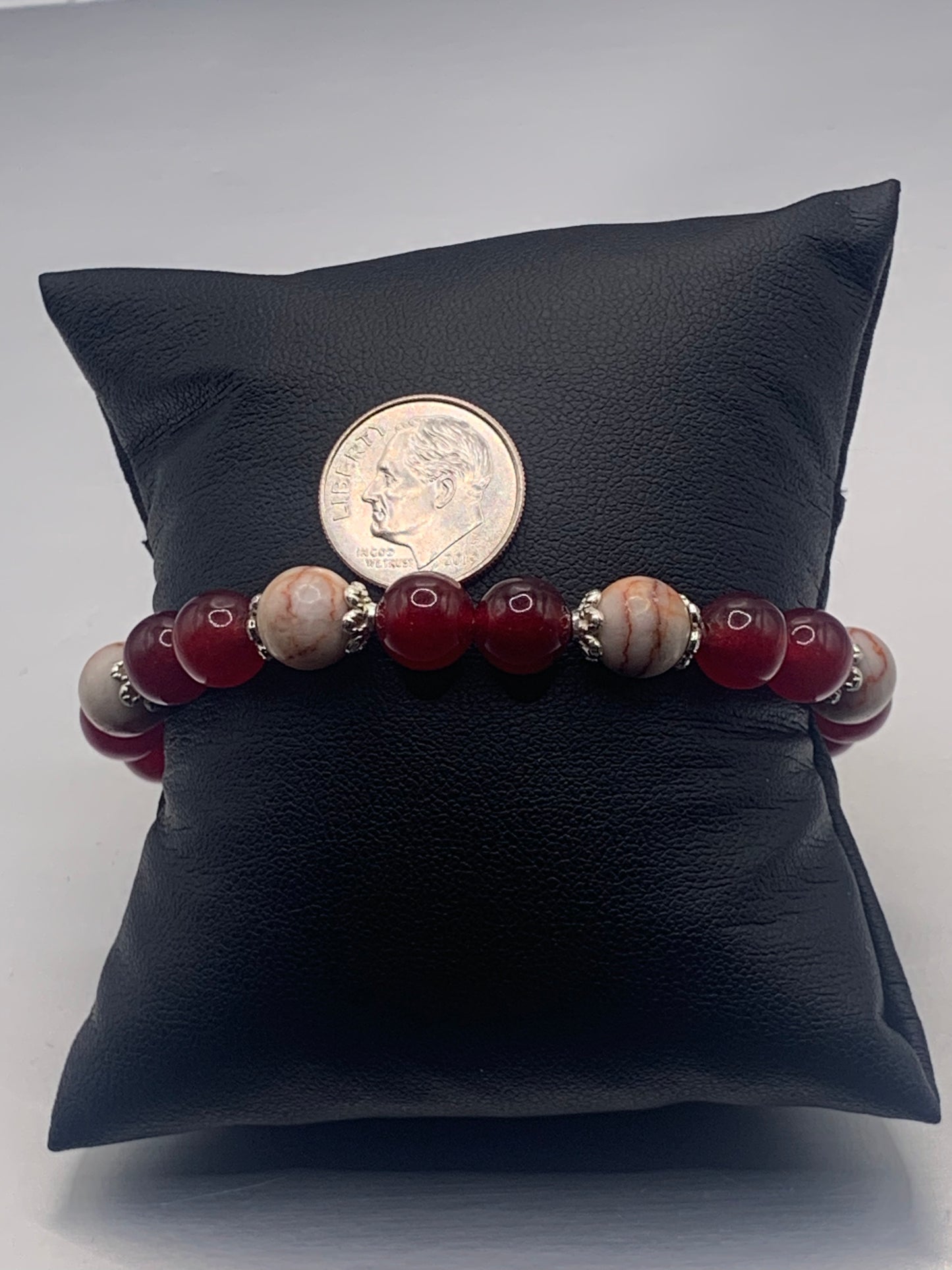 Red vein jasper and red chalcedony semi precious stone/crystal elastic beaded bracelet with silver plated flower bead caps