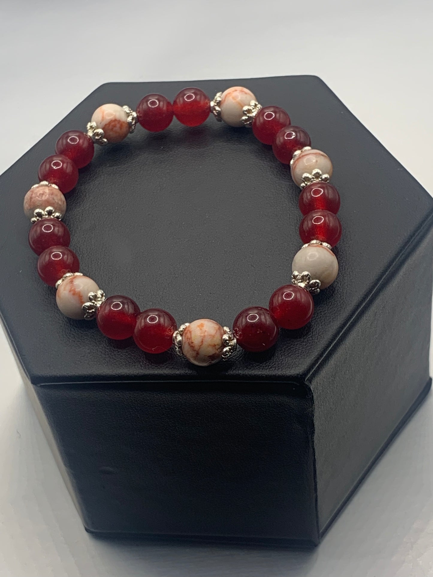 Red vein jasper and red chalcedony semi precious stone/crystal elastic beaded bracelet with silver plated flower bead caps