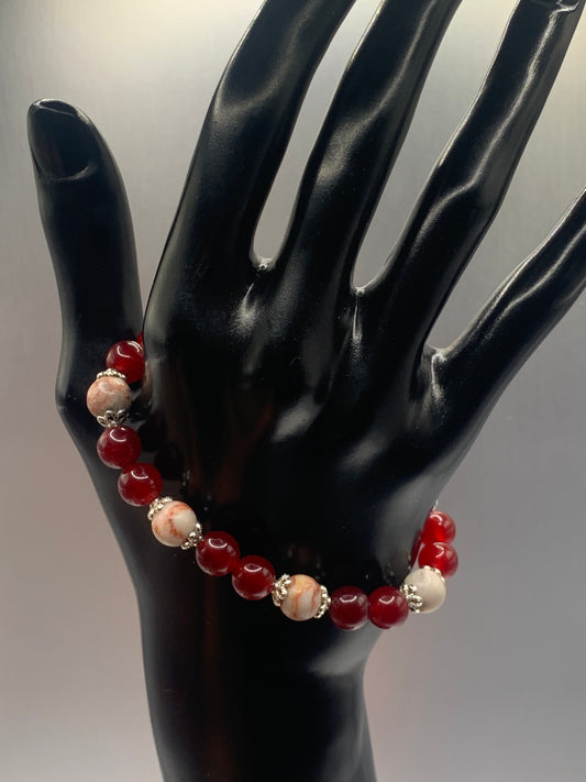 Red vein jasper and red chalcedony semi precious stone/crystal elastic beaded bracelet with silver plated flower bead caps