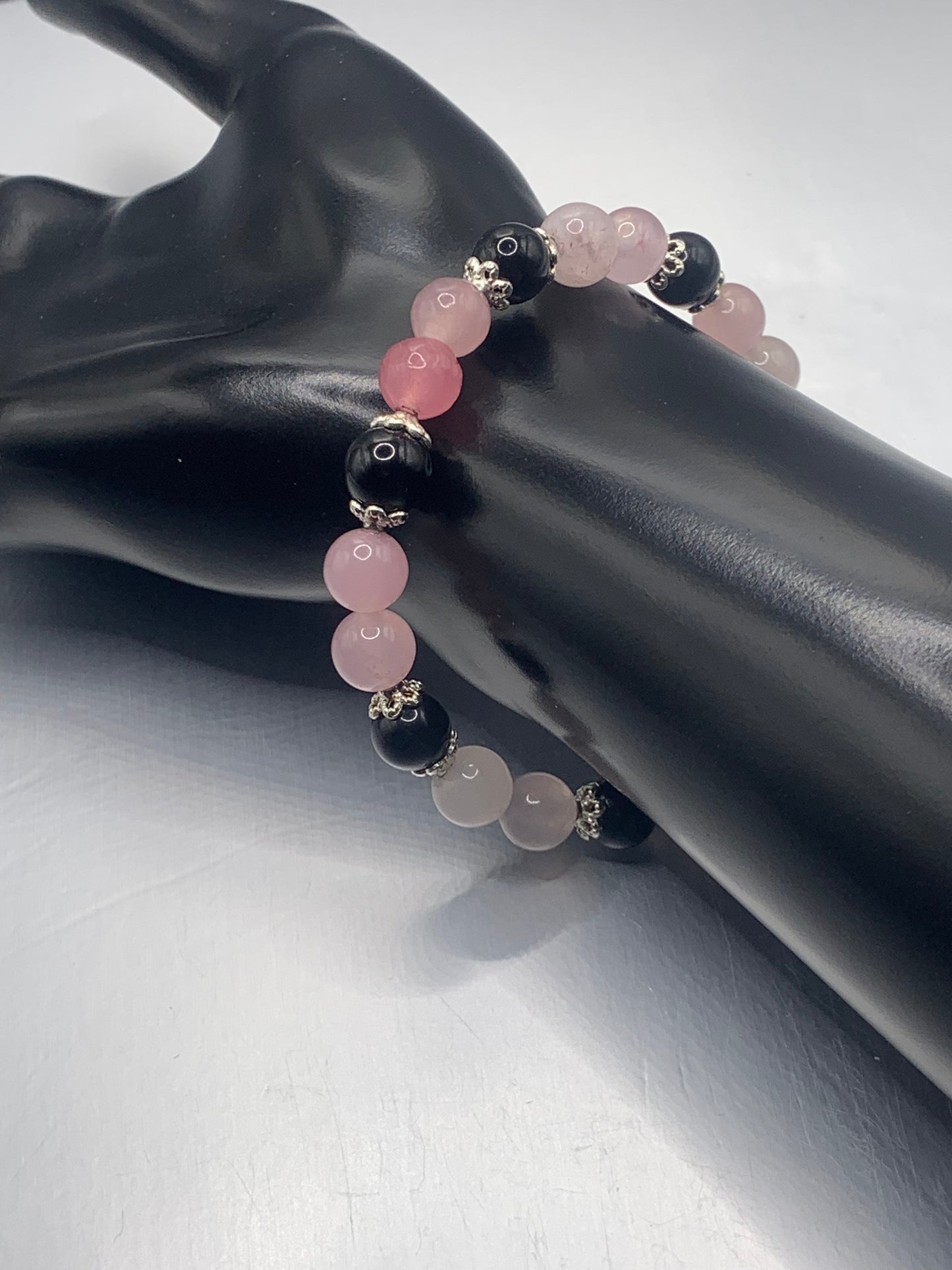 Black obsidian with rose quartz (enhanced) semi precious stone/crystal beaded elastic bracelet with silver plated flower bead caps