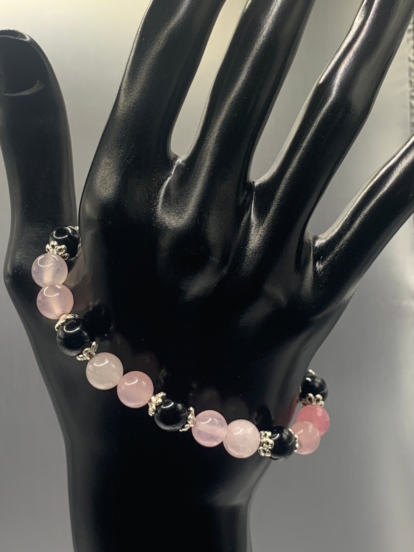 Black obsidian with rose quartz (enhanced) semi precious stone/crystal beaded elastic bracelet with silver plated flower bead caps