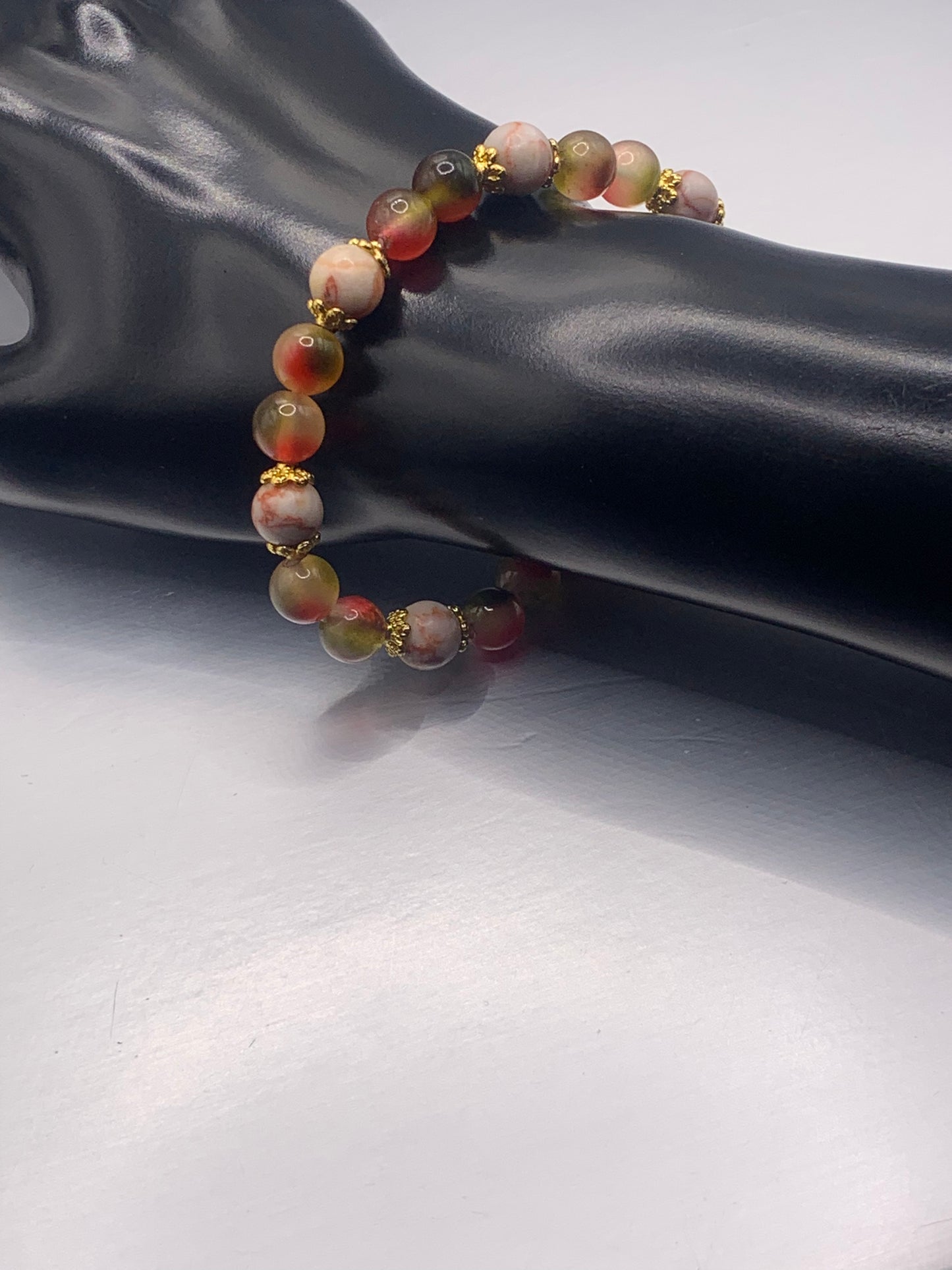 Red vein jasper and watermelon chalcedony semi precious stone/crystal elastic beaded bracelet with gold plated flower bead caps