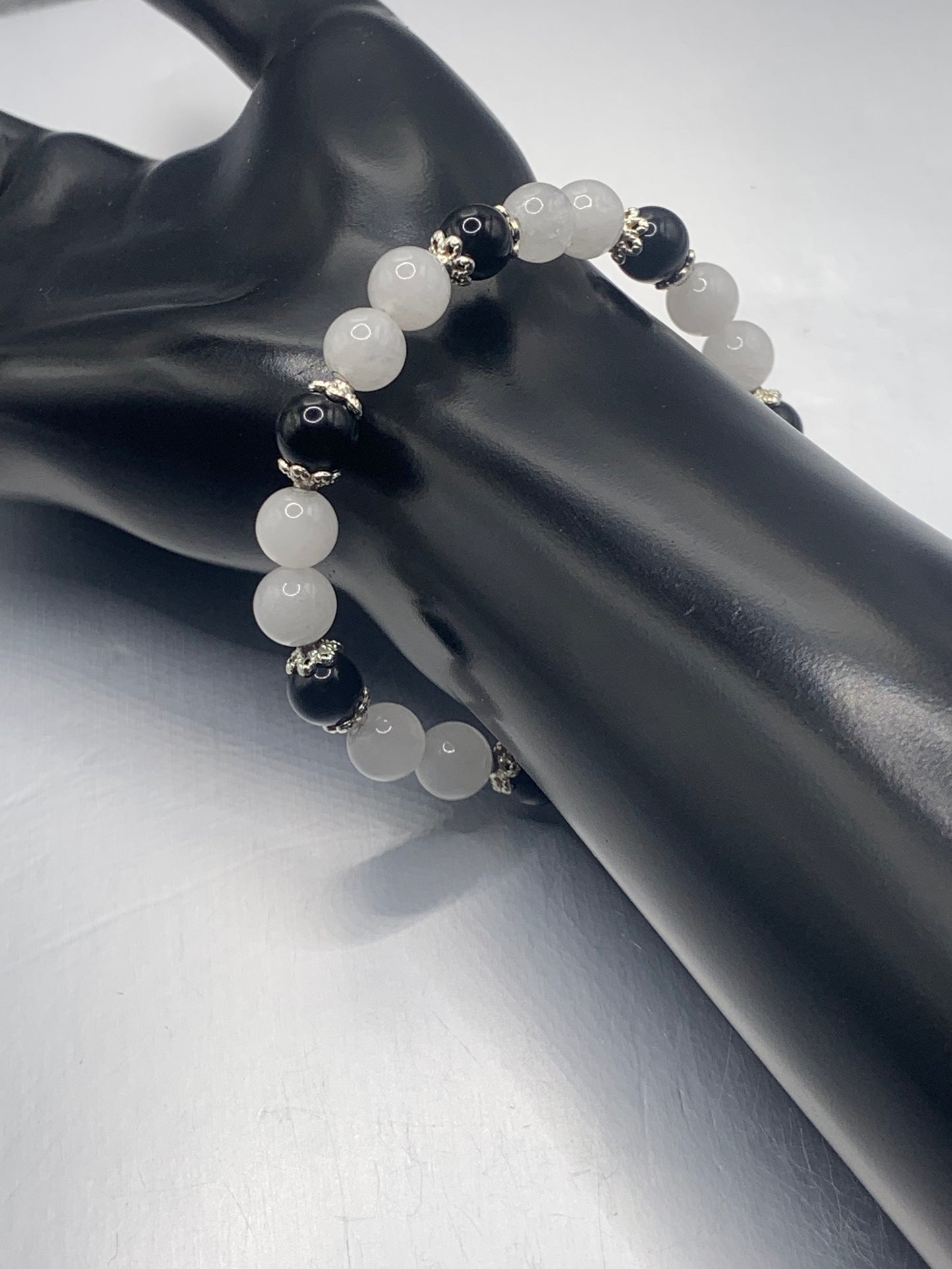 Black obsidian with white chalcedony semi precious stone/crystal beaded elastic bracelet with silver plated flower bead caps