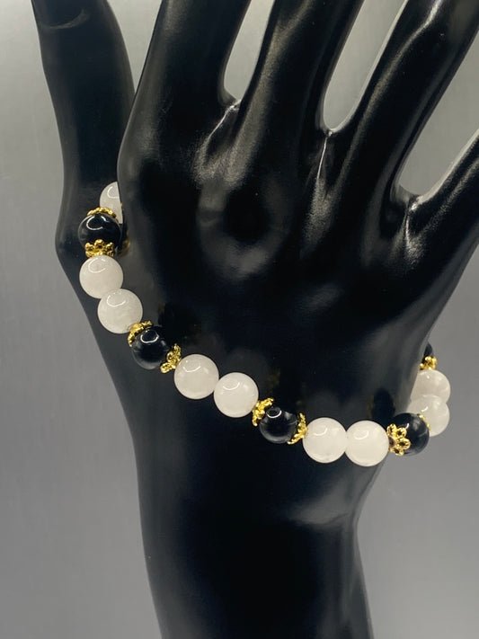 Black obsidian with white chalcedony semi precious stone/crystal beaded elastic bracelet with gold plated flower bead caps