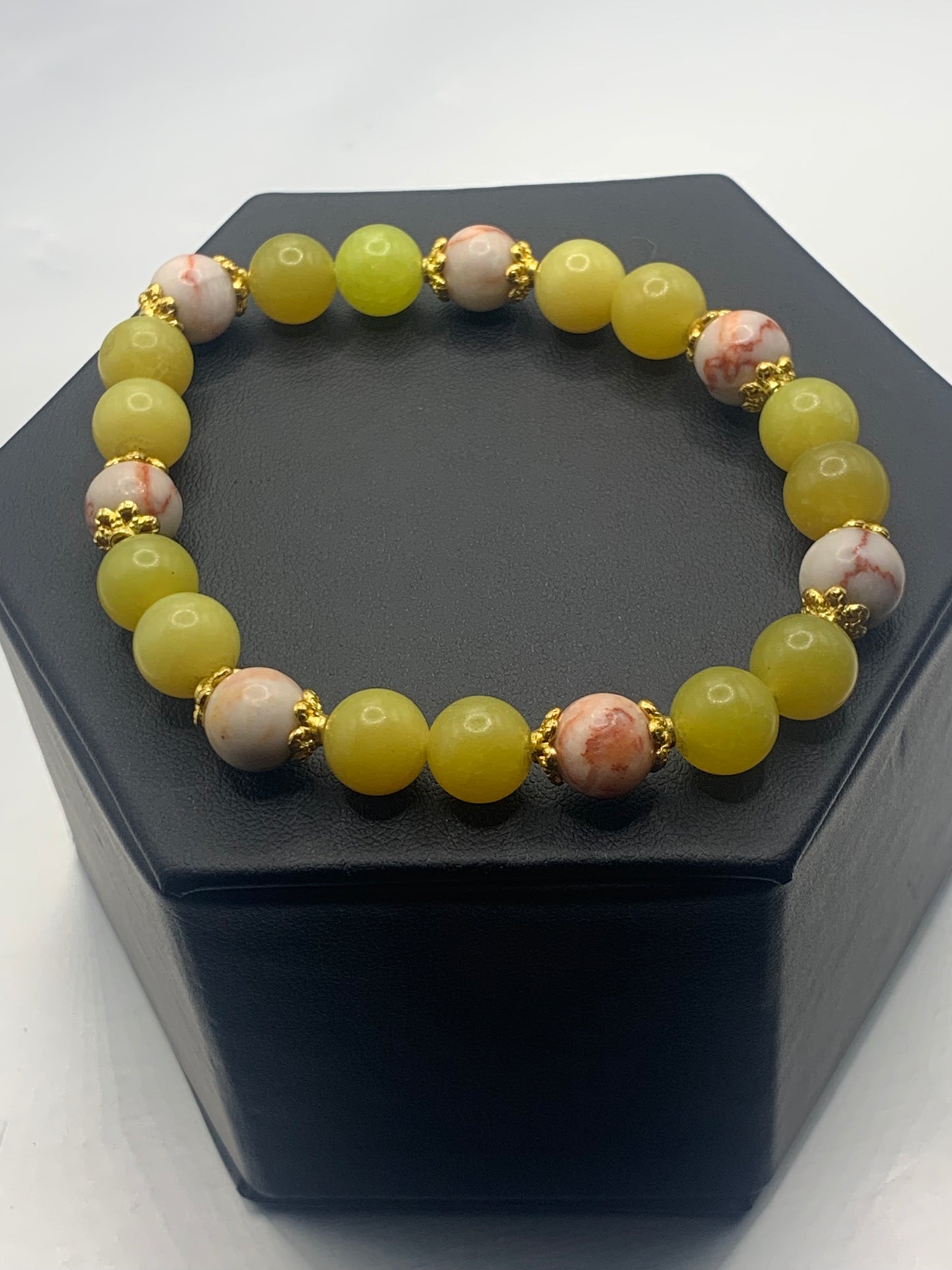 Red vein jasper and yellow jade semi precious stone/crystal elastic beaded bracelet with gold plated flower bead caps