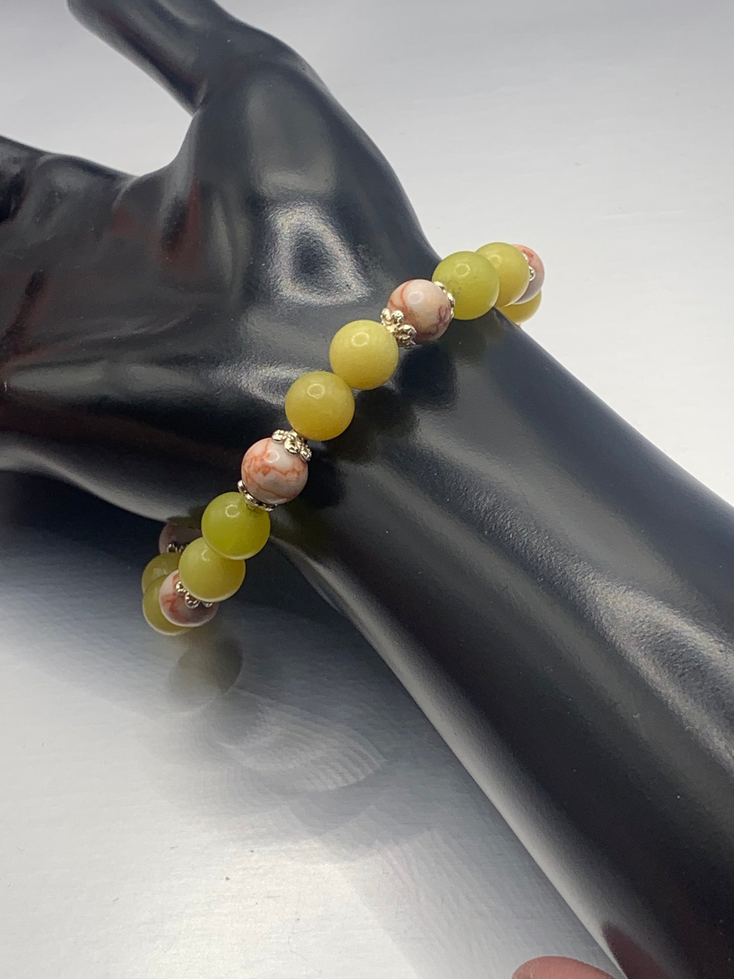 Red vein jasper and yellow jade semi precious stone/crystal elastic beaded bracelet with silver plated flower bead caps