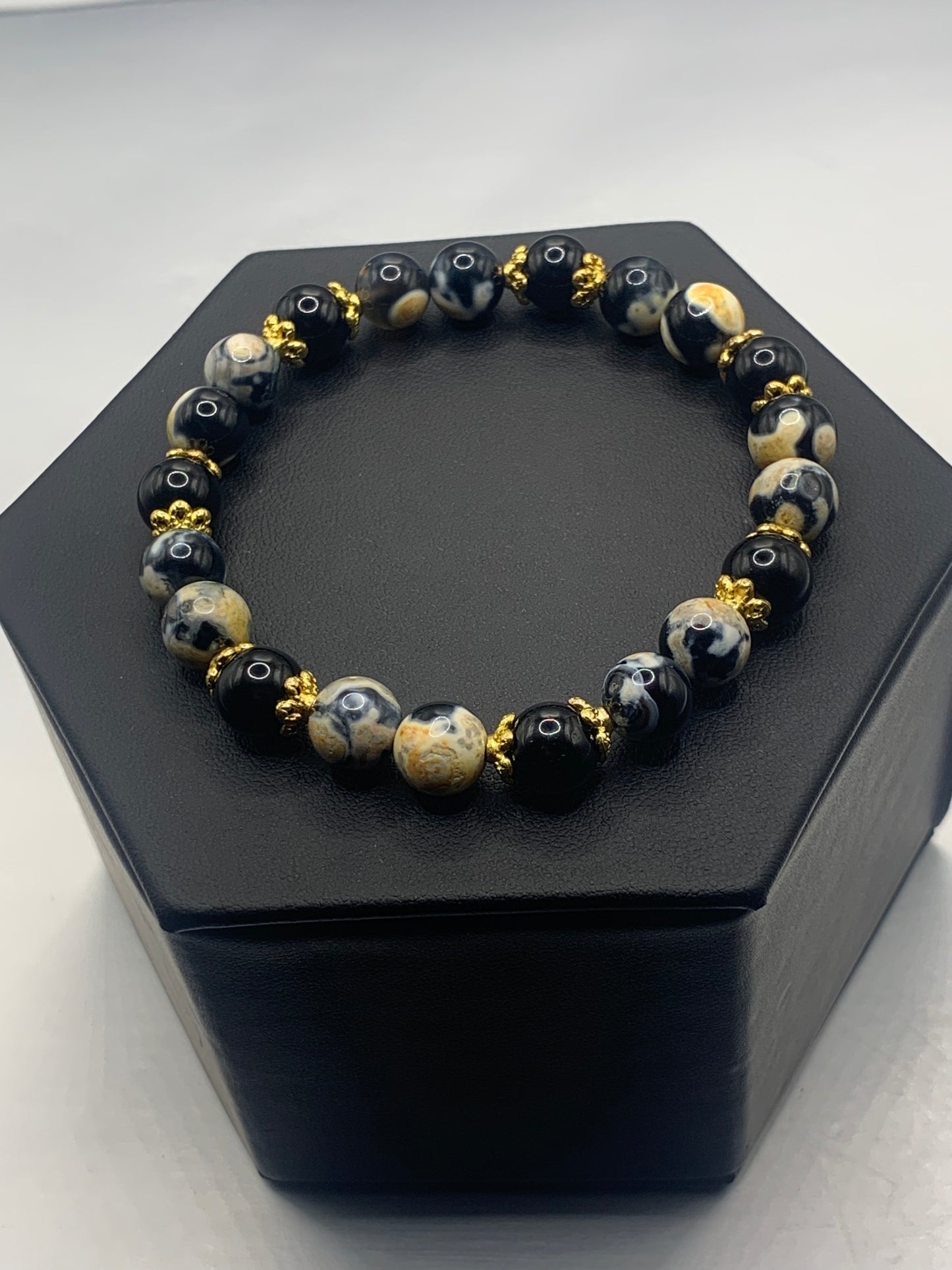 Black obsidian with yellow orca agate semi precious stone/crystal beaded elastic bracelet with gold plated flower bead caps