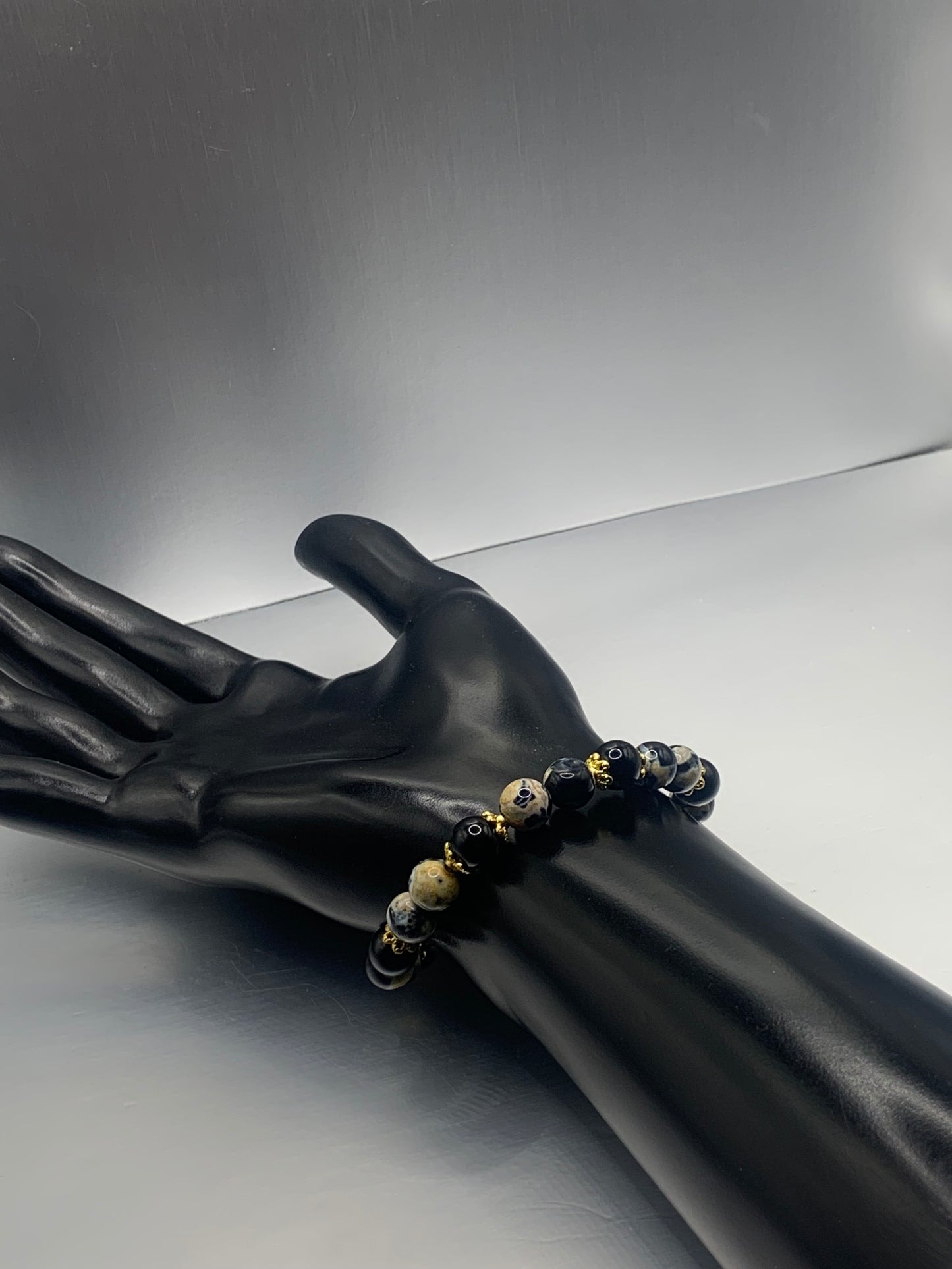 Black obsidian with yellow orca agate semi precious stone/crystal beaded elastic bracelet with gold plated flower bead caps