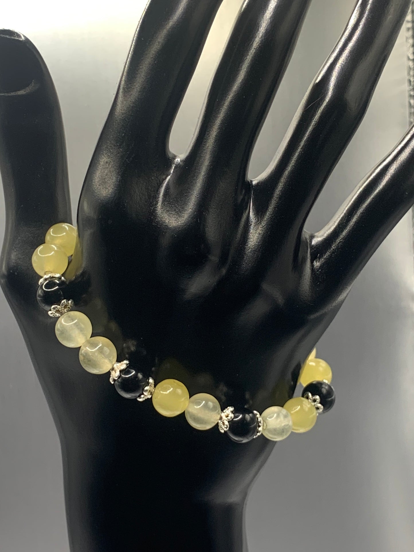 Black obsidian with yellow agate semi precious stone/crystal beaded elastic bracelet with silver plated flower bead caps