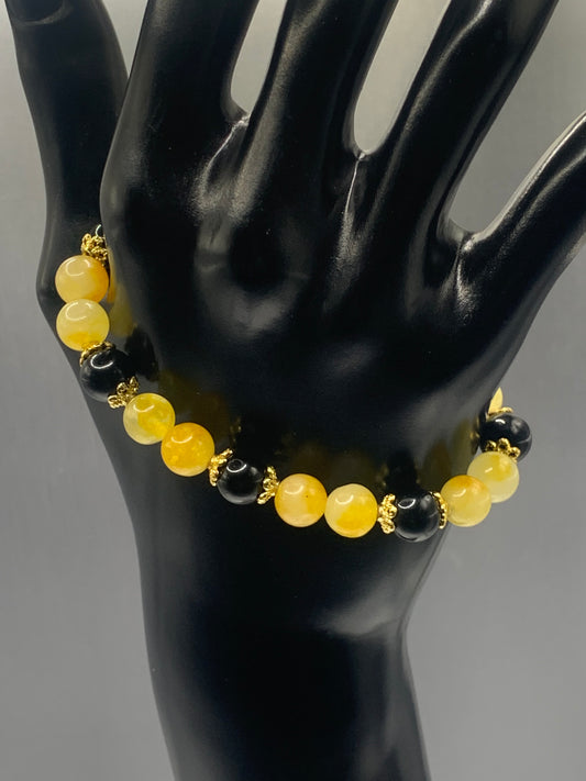 Black obsidian with yellow white chalcedony semi precious stone/crystal beaded elastic bracelet with gold plated flower bead caps