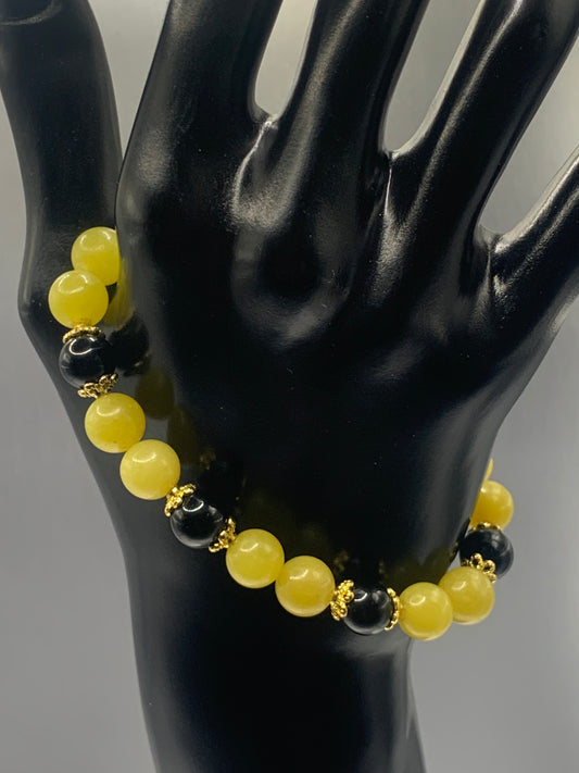 Black obsidian with yellow jade semi precious stone/crystal beaded elastic bracelet with gold plated flower bead caps